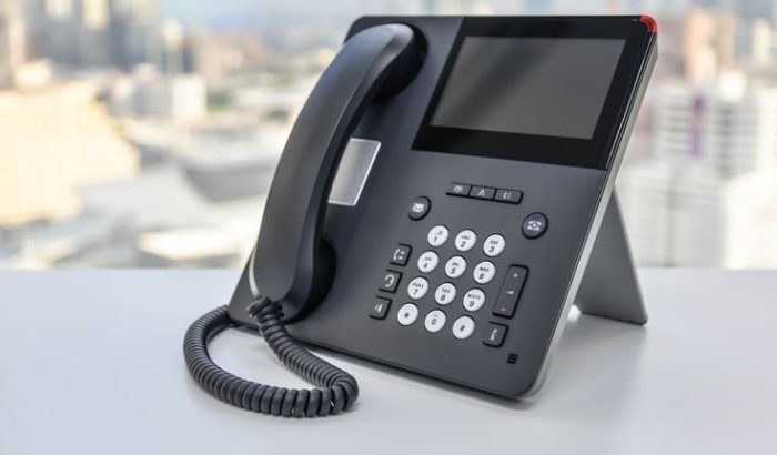 Ip,Phone,On,The,White,Table